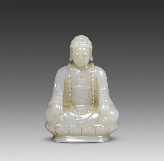 Polished white jade Buddha